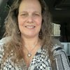 Gina T.
